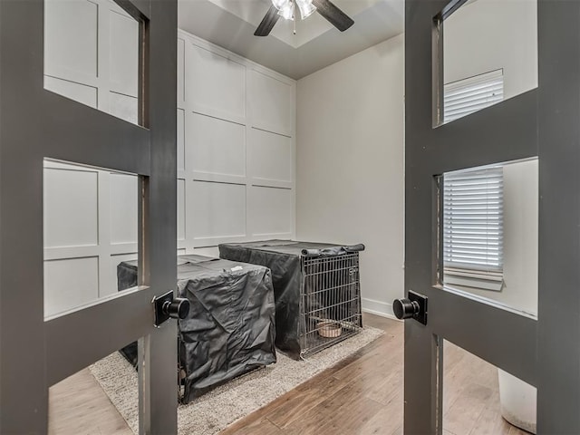 interior space featuring ceiling fan