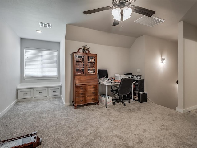 home office featuring lofted ceiling, light carpet, and ceiling fan