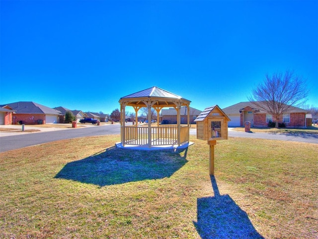 view of play area with a gazebo and a yard