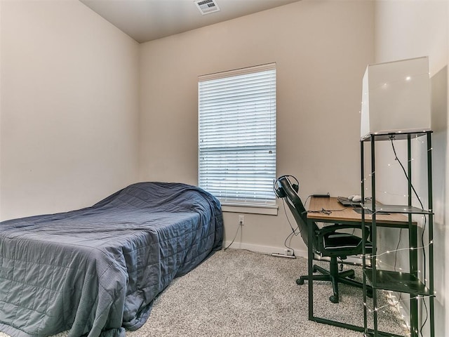 bedroom featuring carpet