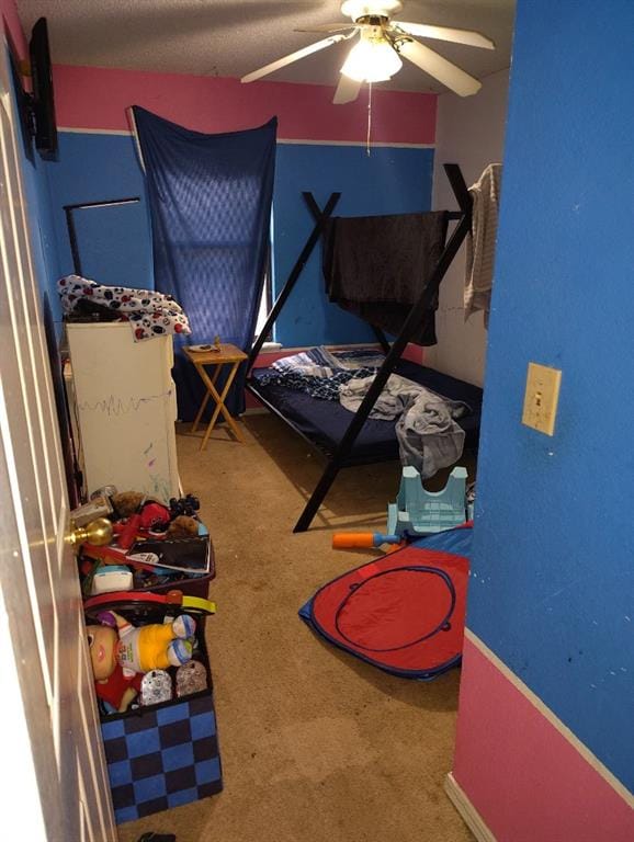 bedroom with carpet floors and ceiling fan