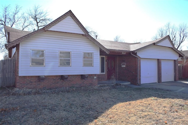 single story home featuring a garage