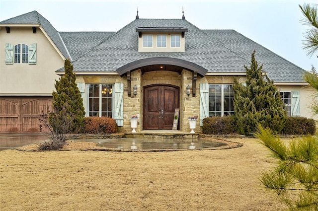 view of front of home with a garage