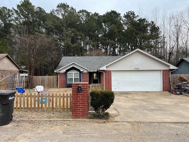 ranch-style home with a garage