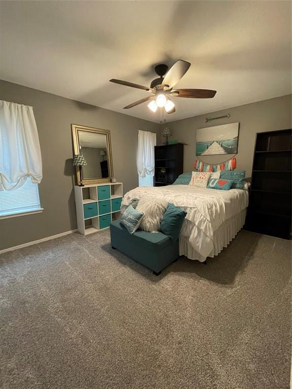 bedroom featuring ceiling fan and carpet floors