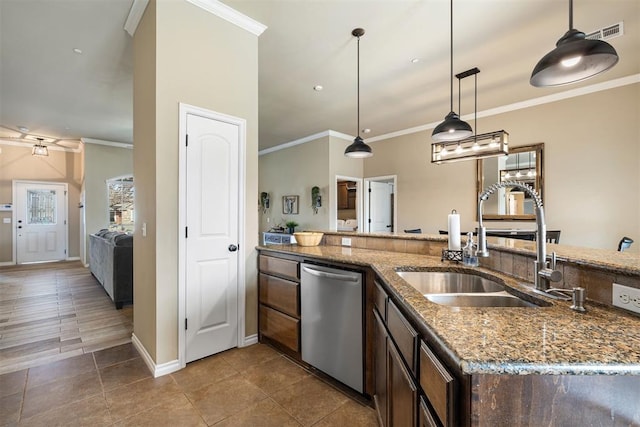 kitchen featuring crown molding, dishwasher, sink, and hanging light fixtures