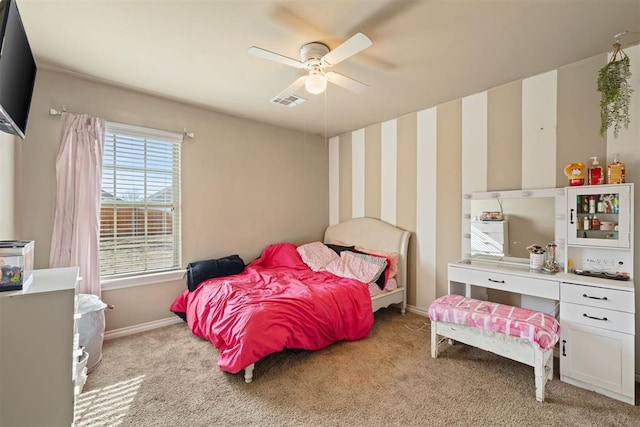 carpeted bedroom featuring ceiling fan