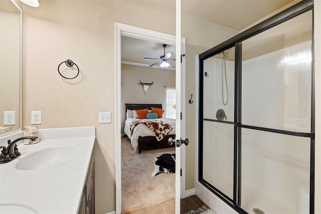 bathroom featuring vanity, tile patterned floors, an enclosed shower, and ceiling fan