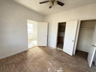 unfurnished bedroom with a closet and ceiling fan