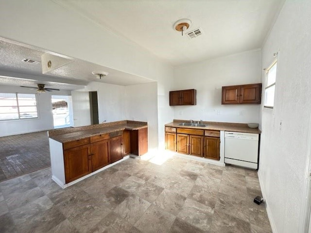 kitchen featuring sink, a textured ceiling, dishwasher, and ceiling fan