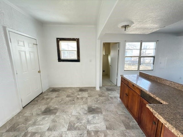 interior space featuring a textured ceiling