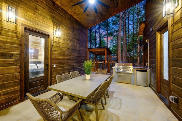 view of patio / terrace featuring area for grilling and ceiling fan