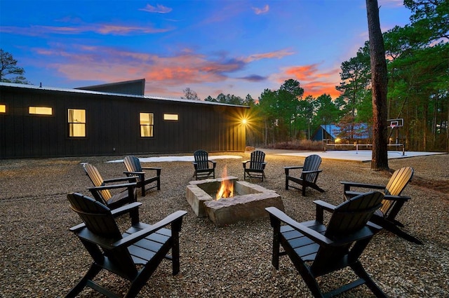 patio terrace at dusk with a fire pit