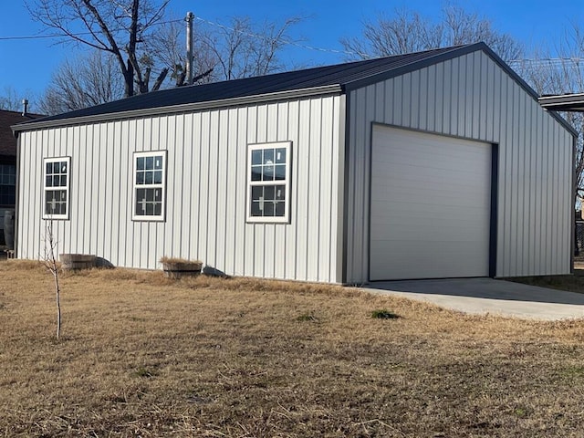 garage featuring a yard