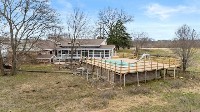 view of pool featuring a wooden deck