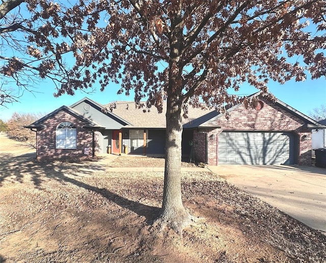 ranch-style house featuring a garage