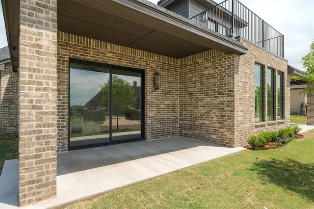 view of patio / terrace with a balcony