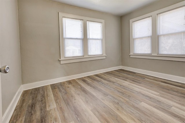 empty room featuring light hardwood / wood-style floors