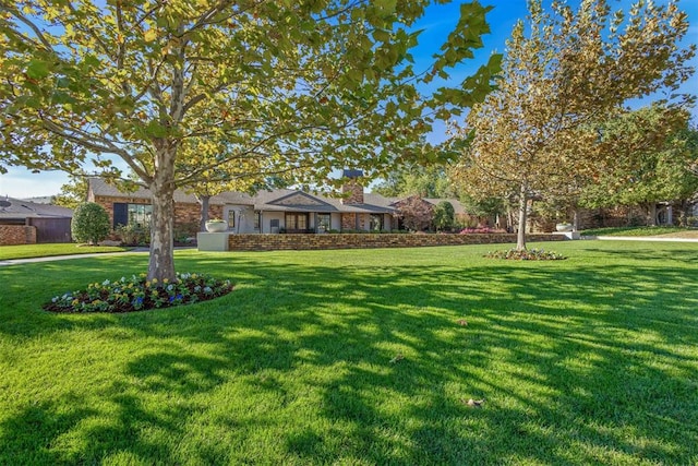 view of front of home with a front lawn