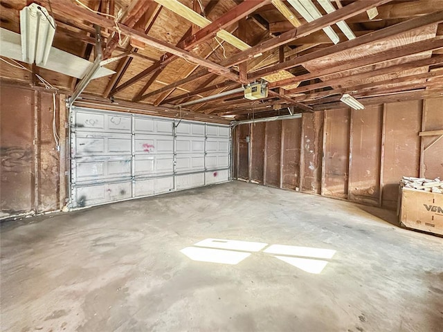 garage featuring a garage door opener