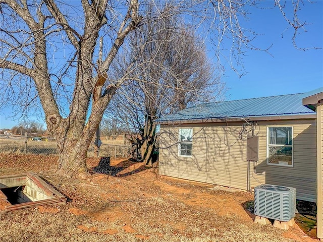 view of yard featuring central AC unit