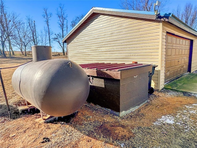 view of side of property featuring a garage