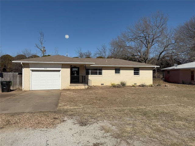 ranch-style home with a garage