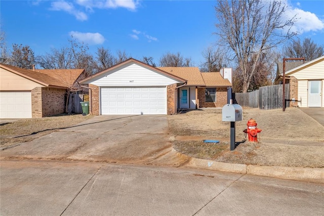 single story home with a garage