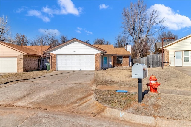 single story home with a garage