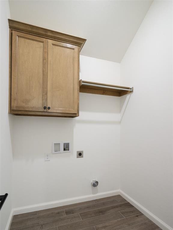 clothes washing area featuring hookup for a washing machine, electric dryer hookup, and dark hardwood / wood-style floors