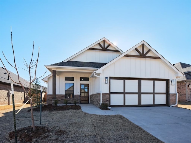 view of front of home with a garage and a porch