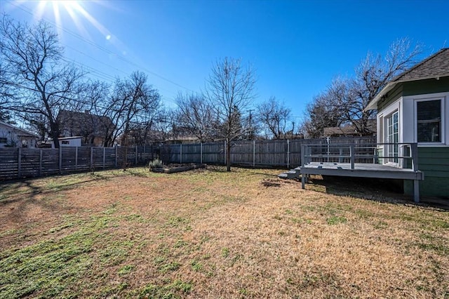 view of yard featuring a deck