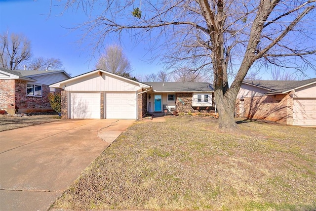 single story home with a garage and a front yard