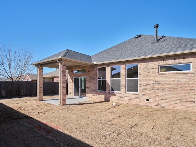 rear view of house with a patio