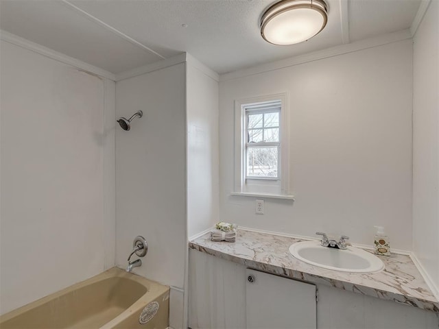 bathroom featuring shower / bath combination and vanity