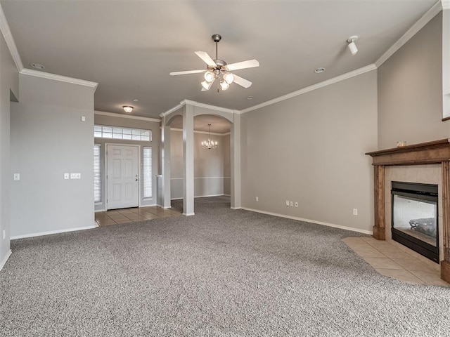 unfurnished living room with light carpet, crown molding, and a tile fireplace