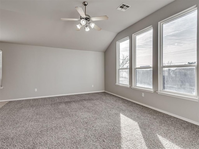 bonus room with ceiling fan, carpet flooring, and vaulted ceiling