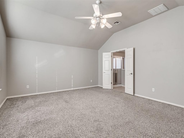 additional living space featuring vaulted ceiling, ceiling fan, and carpet flooring