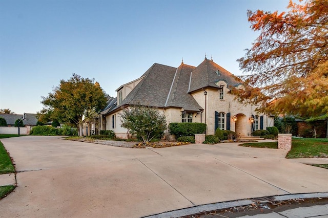 view of french country inspired facade