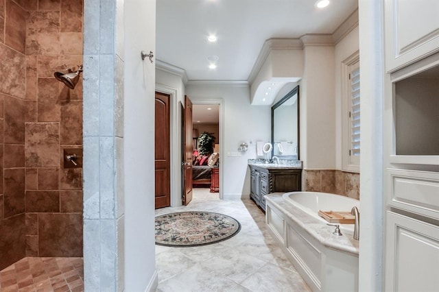 bathroom with crown molding, vanity, and independent shower and bath