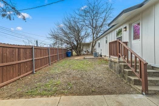 view of yard featuring central AC