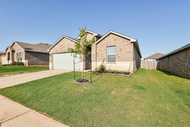 view of front of home featuring a garage and a front yard