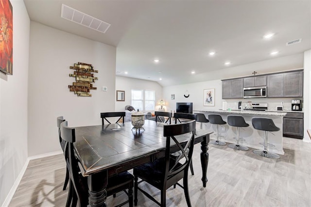 dining room featuring light wood-type flooring