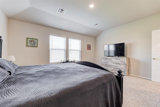 bedroom featuring carpet floors and vaulted ceiling