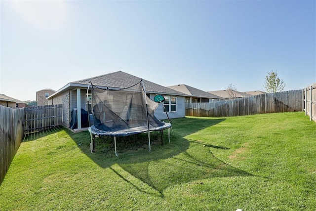 view of yard featuring a trampoline