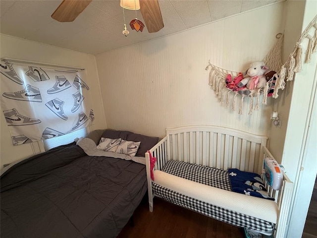 bedroom with wood finished floors