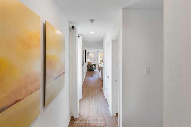 hall featuring light hardwood / wood-style floors