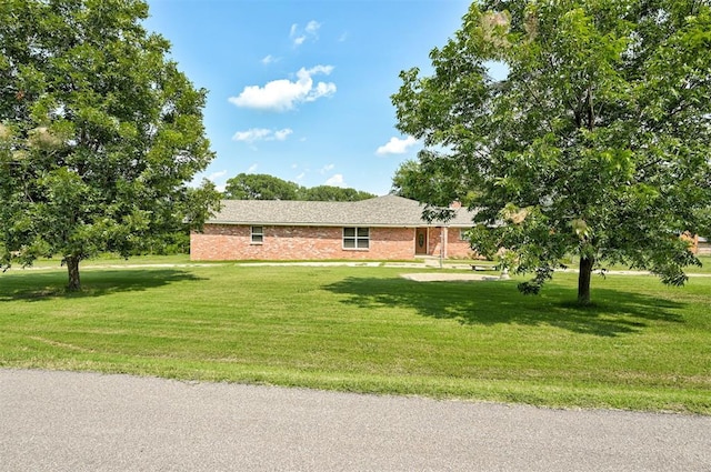 view of front of property with a front lawn