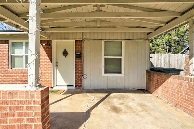 property entrance featuring a patio