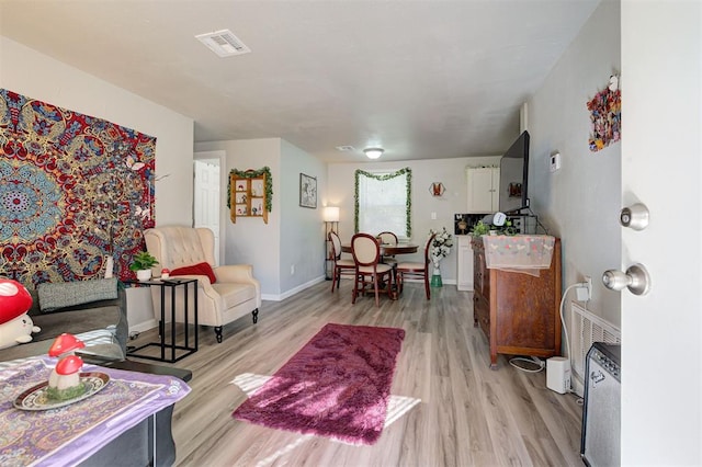 living room featuring light hardwood / wood-style floors